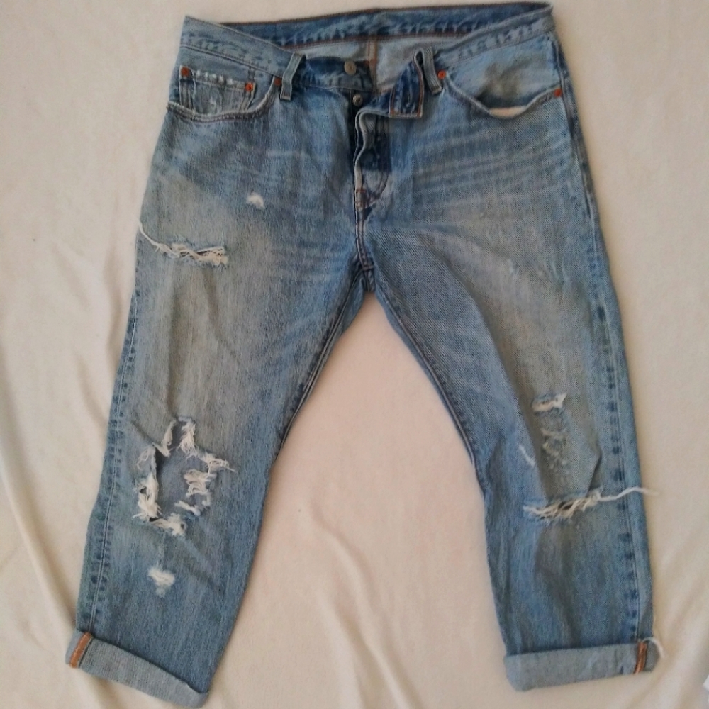 Levi's 501 distressed jeans.